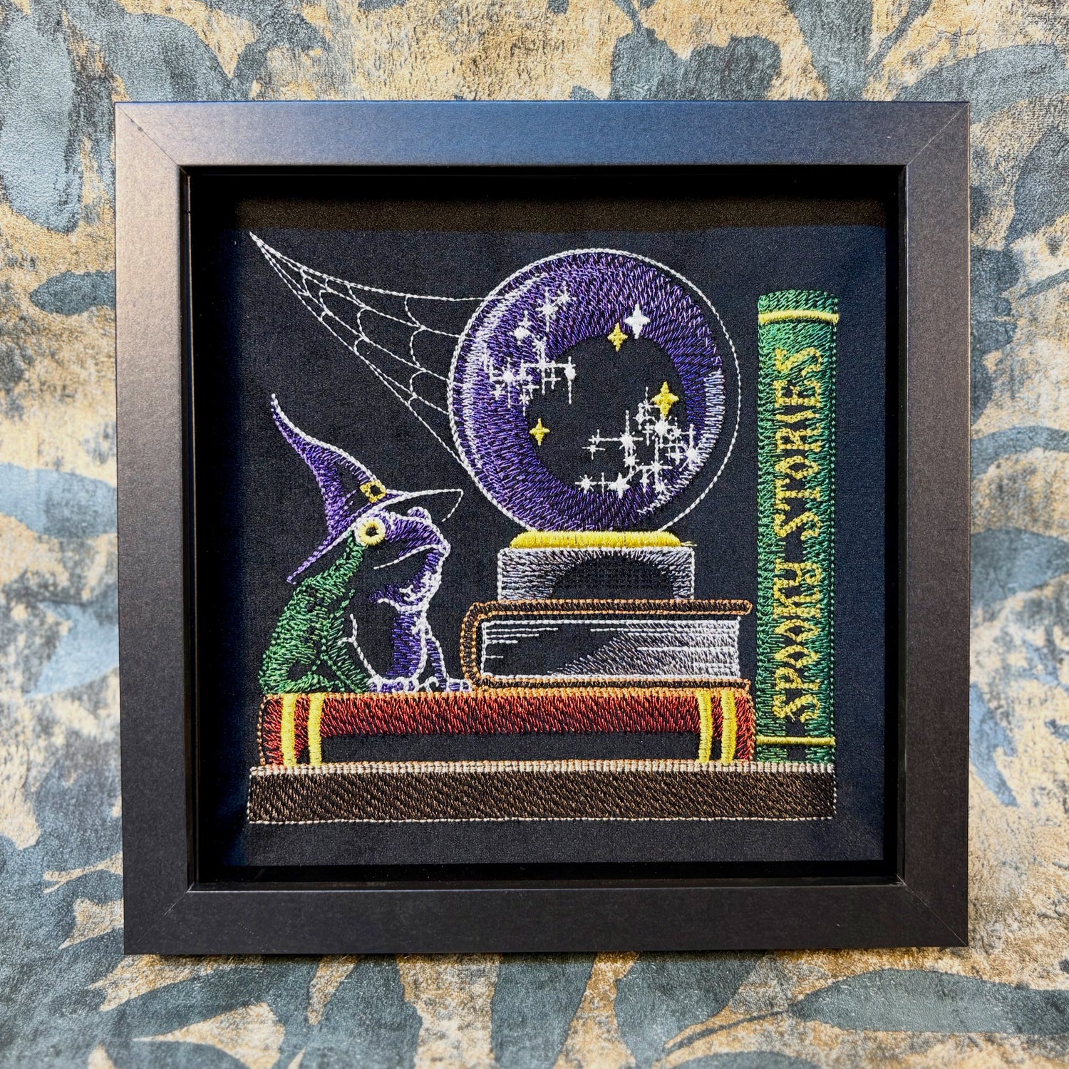 Framed art and embroidery
